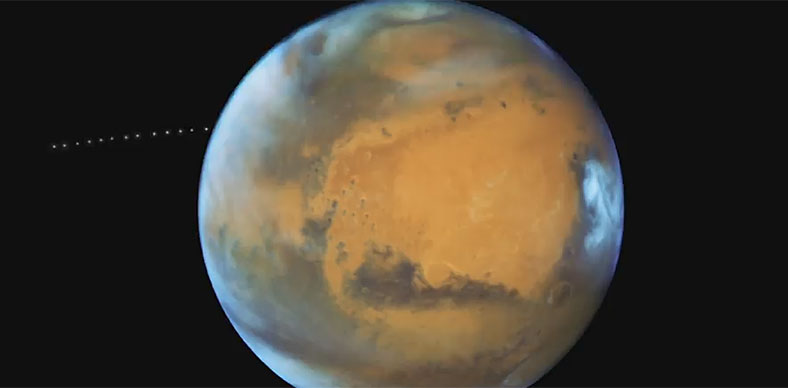 视频：哈勃拍到火星上空飞过的亮点 