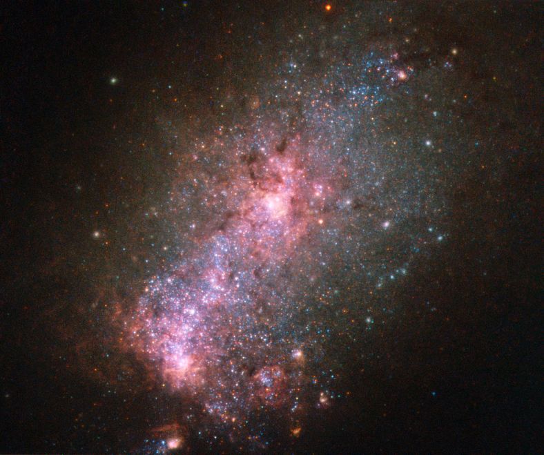 疯狂孕育恒星的星暴星系NGC3125